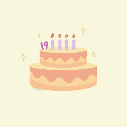 Depicts a frosted two-tiered cake, the cake and frosting both being two-toned in varying oranges. Four lit candles with diagonal purple stripes stand centred at the top, with a pink-purple "19" to their left. Four shine marks sparkle around the cake.